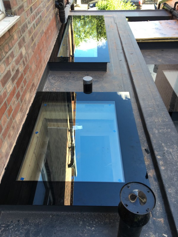Multiple flat roof skylights on extension in South Lambeth